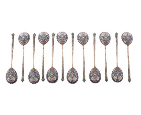 A set of twelve Russian silver gilt and enamel tea spoons by Konstantin...  A set of twelve Russian silver gilt and enamel te