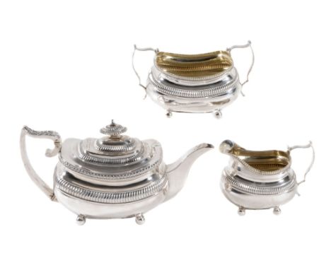 A late George III silver oblong baluster three piece tea service by Solomon...  A late George III silver oblong baluster thre