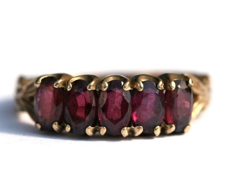 A 9ct gold five-stone garnet ring, approx UK size 'L'.