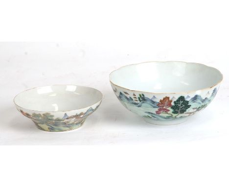 A Chinese famille rose bowl decorated with figures in a landscape, red seal mark to the underside, 13.5cms (5.25ins) diameter