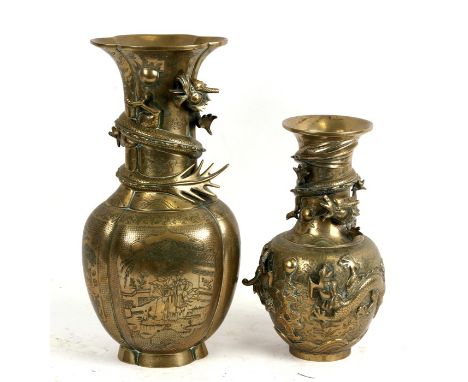 A Chinese bronze vase decorated with figures and a coiled dragon around the neck, 39cms (15.5ins) high; together with another