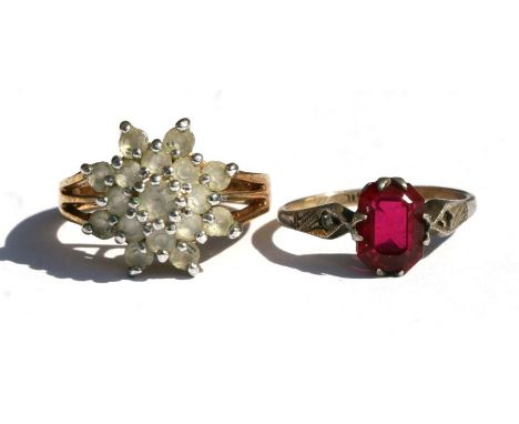 A 9ct gold and silver dress ring; together with a cluster dress ring (2).