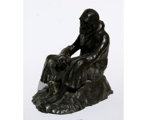 An Irish bronze sculpture depicting a weary Friar, seated on a bank, signed, Dailey, provenance: previously bought at auction