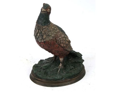A modern cold painted bronze figure of a grouse. 27cms (10.5ins) high.