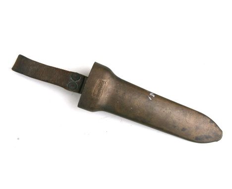 A Henke bronze diver's knife scabbard, 22cms (8.5ins) long.