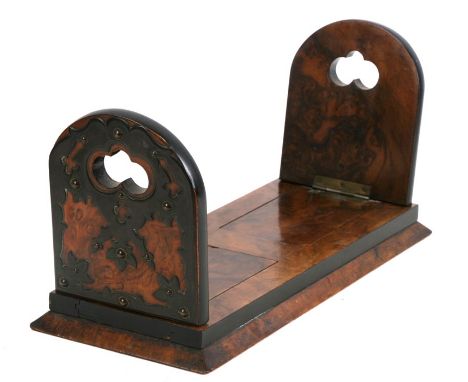 A Victorian walnut extending book trough, 35.5cms (14ins) wide.Condition ReportSome small losses to the veneer at the edges a