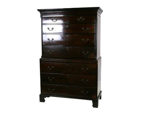 A George III mahogany chest on chest, the upper section with dentil cornice above two short and three long drawers, the lower