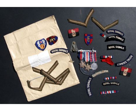 A WWII medal group to include 1939-1945 Star and France and Germany Star; together with a quantity of cloth badges belonging 