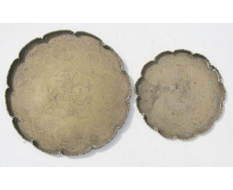 A Chinese bronze tray decorated with figures in a landscape within a foliate border, 35cms (13.75ins) diameter; together with