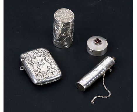 A silver vesta case, Birmingham 1907; together with three other silver trinket boxes.