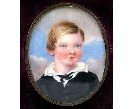 A portrait miniature depicting a young boy, mounted as a brooch in its original shaped and fitted box, 5 by 6cms (2 by 2.25in