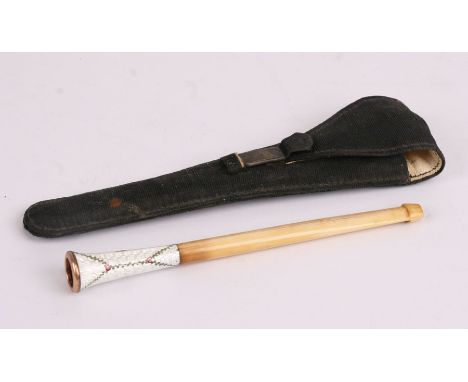 A 1920's guilloche enamel cigarette holder with ivory mouthpiece, in original case, 11cms (4.25ins) long.