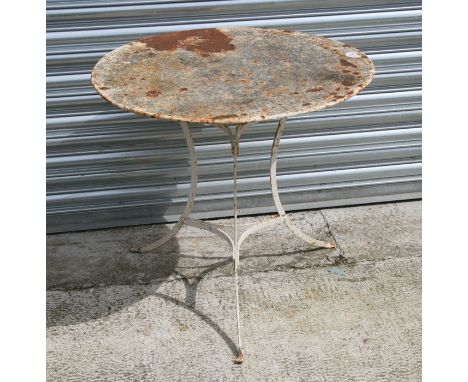 A white painted cast iron garden tripod table, 79cms (31ins) diameter.