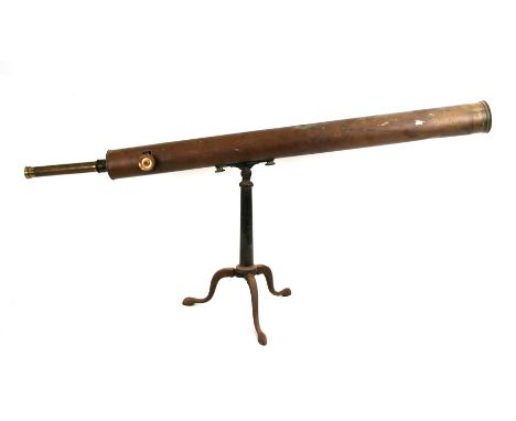 A large late 19th century telescope on triform tripod stand, 125cms (49ins) long.