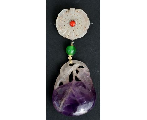 A Chinese jade flower brooch with carved amethyst peach drop, 9cms (3.5ins) high.Condition Reportgood overall condition
