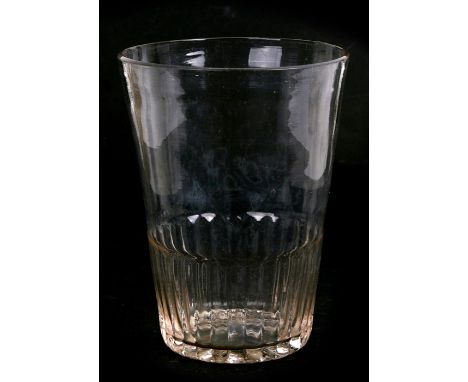 A Georgian glass beaker of quart capacity with moulded lower half and base, 16.5cms (6.5ins) high; together with a ruby flash