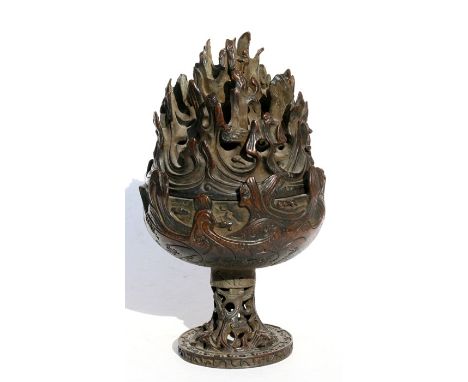 A Chinese bronze censer and cover, the conical cover in the form of stylised flames, 22cms (8.25ins) high.Condition ReportGoo