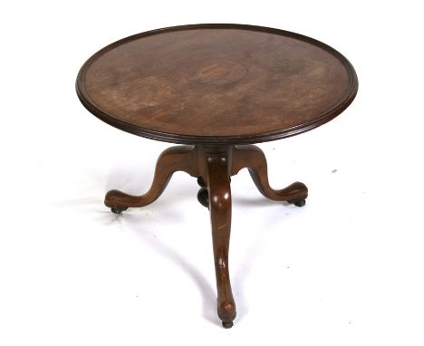 A mahogany occasional table on tripod base, 66cms (26ins) diameter.