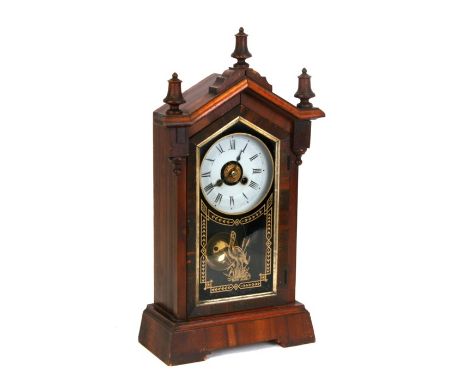 An American architectural simulated rosewood mantle clock, 46cms (18ins) high.