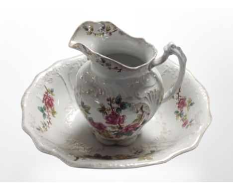 A Victorian transfer-printed pottery wash jug and basin.