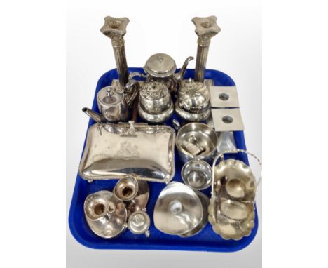 A group of silver plate and stainless stee wares, pair of Corinthian column candlesticks, silver plated table butler with woo