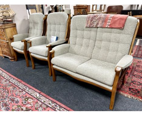 A contemporary stained beech framed three piece lounge or conservatory suite, together with a sofa fabric care kit ***Bought 