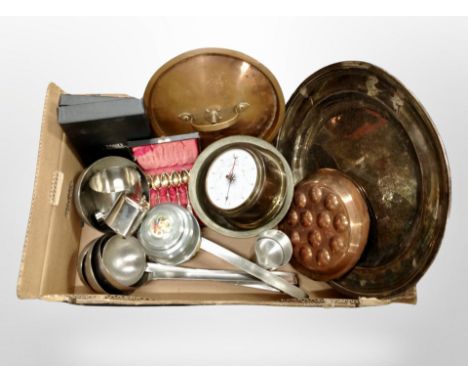 A box of metal wares, large silver plated circular dish, stainless steel ladles, cutlery, barometer etc 