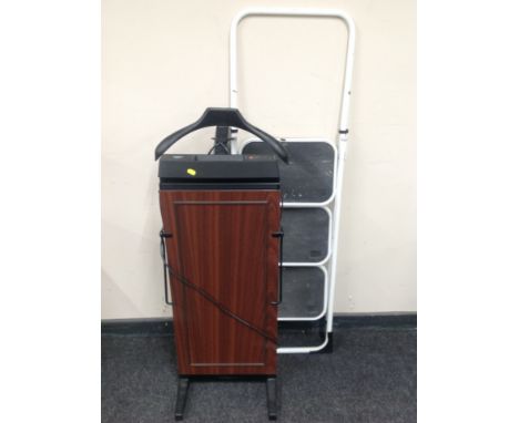 A Korby 4400 trouser press together with multi tread folding step 