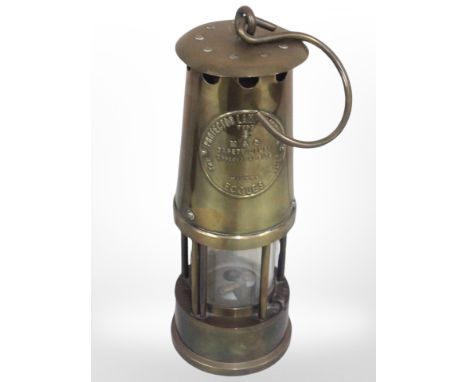An Eccles Protector Type 6 brass miner's lamp.