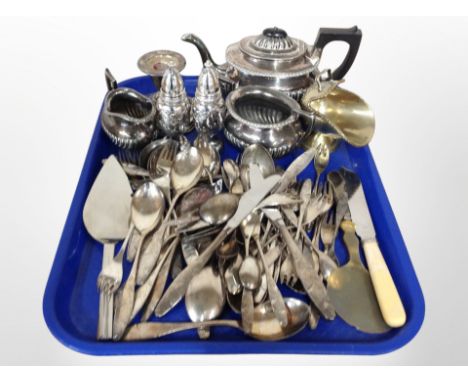 A quantity of silver plated cutlery, tea service, candlestick, servers etc 