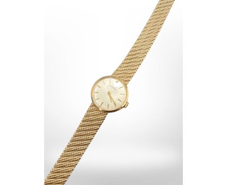 A lady's 9ct gold Eterna wristwatch with integral gold strap. CONDITION REPORT: 24.1g