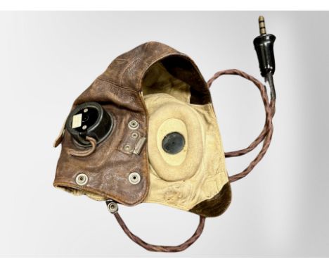A 20th century British military pilot's cap with war department broad arrow mark and serial number 10A/13466