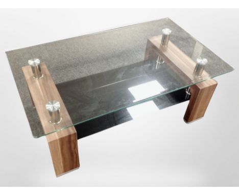 A contemporary glass and wood effect coffee table, 110 cm x 65 cm x 42 cm  