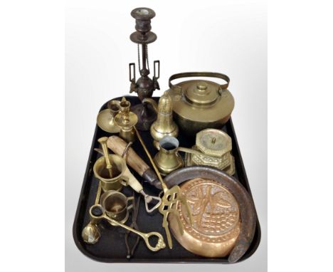 A group of metal wares including brass pricket candlestick, pestle and mortar, kettle, jelly mould, sickle etc 