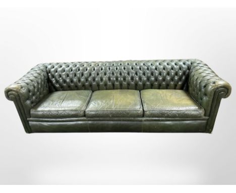 A Chesterfield green button leather club settee, 235 cm x 90 cm x 60 cm high  CONDITION REPORT: Leather somewhat distressed 