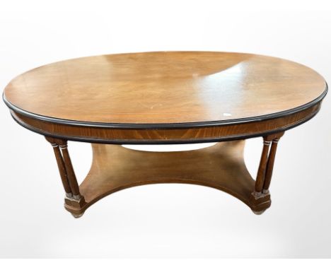 A reproduction mahogany oval coffee table, width 119 cm 