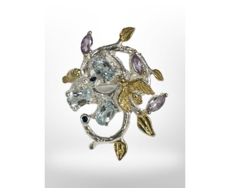 An African blue topaz and amethyst sterling silver gold plated ring 