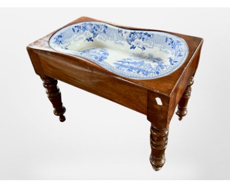 A Victorian mahogany commode stool with inset blue and white transfer printed bowl, length 55 cm 