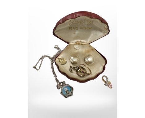 A Victorian ruby and diamond ring (several stones deficient), together with a citrine pendant, a silver St Christopher pendan