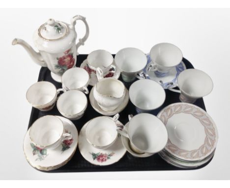 A Royal Standard floral-decorated tea set and other German tea cups and saucers.