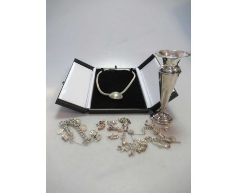 A silver necklace, together with a charm bracelet, twelve loose charms and a candle stick (15)