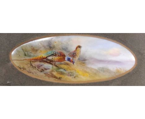A small framed Royal Worcester oval painted with pheasants by James Stinton, 3 x 9cm