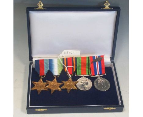 A WW2 group of 5 re-issue medals, named to 'CHX114841 MNE R K Worth Royal Marines'