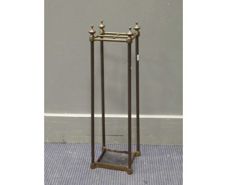 A four division brass stick stand, 61 x 18 x 18cm