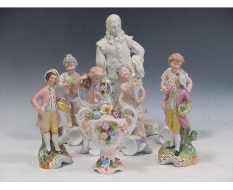 A set of four Portugese ceramic figures depicting the seasons together with a white glazed ceramic model of a standing gentle