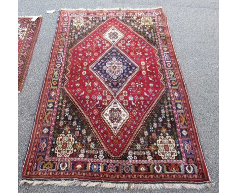 An intricate Qashqai carpet, 267 x 148cm