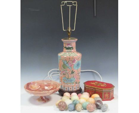An Oriental type pink ground ceramic lamp decorated with birds, approx 50cm high; together with a bowl of specimen stone eggs