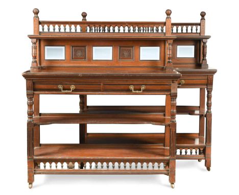 the raised gallery back with mirror and rosette carved panels above two drawers with two tiers below, raised on turned and fl
