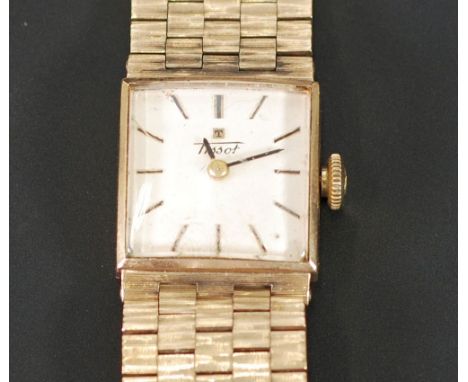 LADY'S 9CT GOLD TISSOT WRIST WATCH, 17 jewel movement, square silvered dial with batons, in square case, on integral 9ct gold