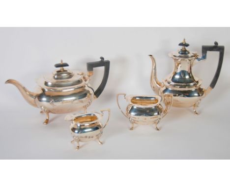 SILVER TEA AND COFFEE SERVICE OF 4 PIECES OF GEORGIAN STYLE, rounded oblong and bulbous and raised on feet, viz teapot and co